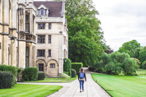 Student walking across campus